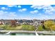 Scenic aerial shot of a lakefront community, showcasing landscaped yards and luxury homes by the water at 4703 River Ridge Dr, Indianapolis, IN 46240