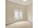 Neutral bedroom with a large window allowing lots of natural light at 4703 River Ridge Dr, Indianapolis, IN 46240