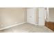 Bedroom with double closets and neutral carpet at 4703 River Ridge Dr, Indianapolis, IN 46240