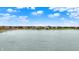 Expansive lake view showcasing waterfront homes with private docks nestled along the shore at 4703 River Ridge Dr, Indianapolis, IN 46240