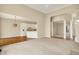 Open-concept living room leads into a dining area, showcasing the seamless flow and spacious design at 4703 River Ridge Dr, Indianapolis, IN 46240