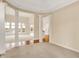 Bright, spacious living room with pillars, and views of the outdoors at 4703 River Ridge Dr, Indianapolis, IN 46240