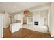 Open concept floorplan of a kitchen, dining and living space at 4703 River Ridge Dr, Indianapolis, IN 46240