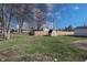 Spacious backyard featuring a shed and secure fencing, perfect for outdoor activities and privacy at 4812 Eastgate Dr, Columbus, IN 47203