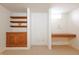 Finished basement with built-in shelving and a desk area at 4812 Eastgate Dr, Columbus, IN 47203