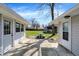 View of backyard featuring a patio, shed, and green yard at 5887 Meadowlark Dr, Indianapolis, IN 46226