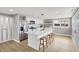 Stylish kitchen with stainless steel appliances, a large island, and modern fixtures at 5887 Meadowlark Dr, Indianapolis, IN 46226
