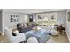 Bright living room boasts large windows, modern decor, and stylish furnishings at 5887 Meadowlark Dr, Indianapolis, IN 46226