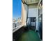 Balcony showcasing an outside view of the city and the bedroom inside the unit at 611 N Park Ave # 405, Indianapolis, IN 46204