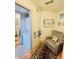 Cozy Bedroom area with a comfortable chair, stacked washer/dryer, and playful decorations at 611 N Park Ave # 405, Indianapolis, IN 46204