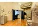 Cozy Bedroom with hardwood floors, comfortable seating, canopy, and tranquil decor at 611 N Park Ave # 405, Indianapolis, IN 46204
