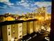 Spectacular nighttime view of the illuminated city skyline from a residential building at 611 N Park Ave # 405, Indianapolis, IN 46204