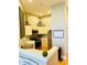 Modern kitchen with white cabinets, stainless steel appliances, and an open layout at 611 N Park Ave # 405, Indianapolis, IN 46204