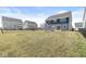 Spacious backyard with newly laid grass and an iron fence at 629 Washington St, Fortville, IN 46040