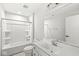 Clean bathroom with combined tub and shower, and modern vanity at 629 Washington St, Fortville, IN 46040