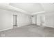 Unfurnished bedroom with plush carpet, large windows, and recessed lighting at 629 Washington St, Fortville, IN 46040