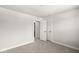 Well lit bedroom featuring neutral carpet and door to closet or bathroom at 629 Washington St, Fortville, IN 46040