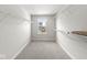 Walk-in closet with wall mounted chrome shelving and a window providing natural light at 629 Washington St, Fortville, IN 46040