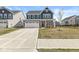 Attractive two-story home with a two-car garage and well-manicured lawn, perfect for suburban living at 629 Washington St, Fortville, IN 46040