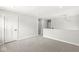 Carpeted loft space with natural light and ample room for relaxing and entertaining at 629 Washington St, Fortville, IN 46040