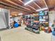 Large unfinished basement with exposed ceiling and carpet offers flexibility for customization at 6746 Wilmot Ln, Avon, IN 46123