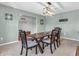 Elegant dining room featuring a wooden table with seating, creating a perfect space for meals and gatherings at 6746 Wilmot Ln, Avon, IN 46123