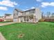Charming two-story home with a well-manicured lawn and inviting front porch at 6746 Wilmot Ln, Avon, IN 46123