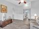 Upstairs hallway featuring vaulted ceilings, wood floors, and easy access to bedrooms at 6746 Wilmot Ln, Avon, IN 46123