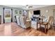 Cozy living room with comfortable seating, a fireplace, and ample natural light, creating a relaxing atmosphere at 6746 Wilmot Ln, Avon, IN 46123