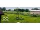 Backyard featuring grass, trees, and a barn at 7154 S 325 W, Jamestown, IN 46147