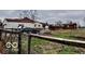 View of the backyard with fence at 7154 S 325 W, Jamestown, IN 46147