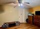 Bedroom with wood floors and a ceiling fan at 7154 S 325 W, Jamestown, IN 46147