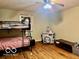 Bedroom featuring a bunk bed and ceiling fan at 7154 S 325 W, Jamestown, IN 46147
