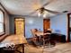 Cozy dining room features wood floors, a dining table with chairs, and a view to the bathroom at 7154 S 325 W, Jamestown, IN 46147