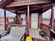 Covered porch with seating at 7154 S 325 W, Jamestown, IN 46147