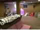 Finished basement features a play area, neutral carpet, and casual seating at 7336 Hardin Oak Dr, Noblesville, IN 46062