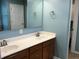 Bathroom vanity with double sinks and modern faucets and white countertops at 7336 Hardin Oak Dr, Noblesville, IN 46062