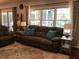 Inviting living room featuring a comfortable sofa, natural light, and stylish decor at 7336 Hardin Oak Dr, Noblesville, IN 46062