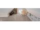 Upstairs bonus room with built-in shelving, small table, chairs and a window at 774 Woodruff Pl E Dr, Indianapolis, IN 46201
