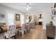 Bright dining area open to the kitchen, featuring natural light and stylish decor at 774 Woodruff Pl E Dr, Indianapolis, IN 46201