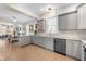 Spacious open kitchen featuring sleek countertops, modern appliances, and ample cabinetry at 774 Woodruff Pl E Dr, Indianapolis, IN 46201
