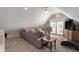 Upstairs living room with a sofa, TV and multiple windows at 774 Woodruff Pl E Dr, Indianapolis, IN 46201