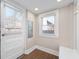 Cozy mud room with ample natural light, and a convenient entry point to the home at 774 Woodruff Pl E Dr, Indianapolis, IN 46201