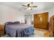 Serene bedroom with ample storage and natural light, creating a comfortable and inviting space at 7916 W 275 N, Boggstown, IN 46110