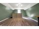 Inviting bonus room featuring natural light, wood-look floors, and space for an office or library at 7916 W 275 N, Boggstown, IN 46110