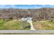 Charming home with a long driveway and a well-maintained front yard at 7916 W 275 N, Boggstown, IN 46110