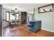Open-concept kitchen with dining area, island, and wood-burning stove, blending functionality and rustic charm at 7916 W 275 N, Boggstown, IN 46110