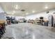 Expansive workshop space with bright lighting, ideal for hobbies and equipment storage at 7916 W 275 N, Boggstown, IN 46110