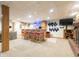 Finished basement featuring a custom bar, fireplace, and entertainment area at 7984 S Deer Lake Dr, Nineveh, IN 46164