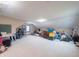 Spacious bonus room with neutral carpeting, storage, and great ceiling height at 7984 S Deer Lake Dr, Nineveh, IN 46164